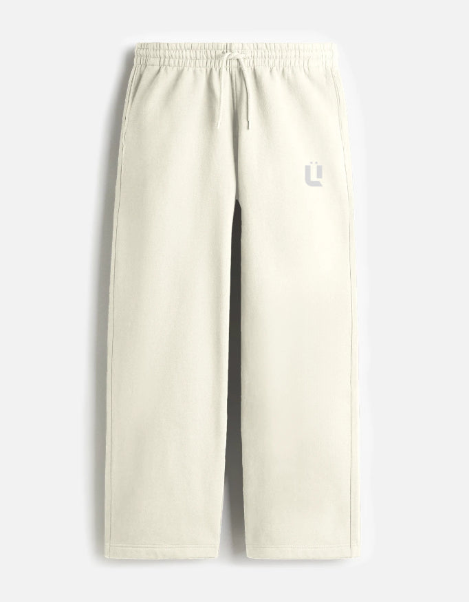 Beige sweatpants on a light gray background